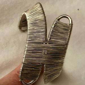 Two silver fashion bracelets black cuff wrap magnetic closure